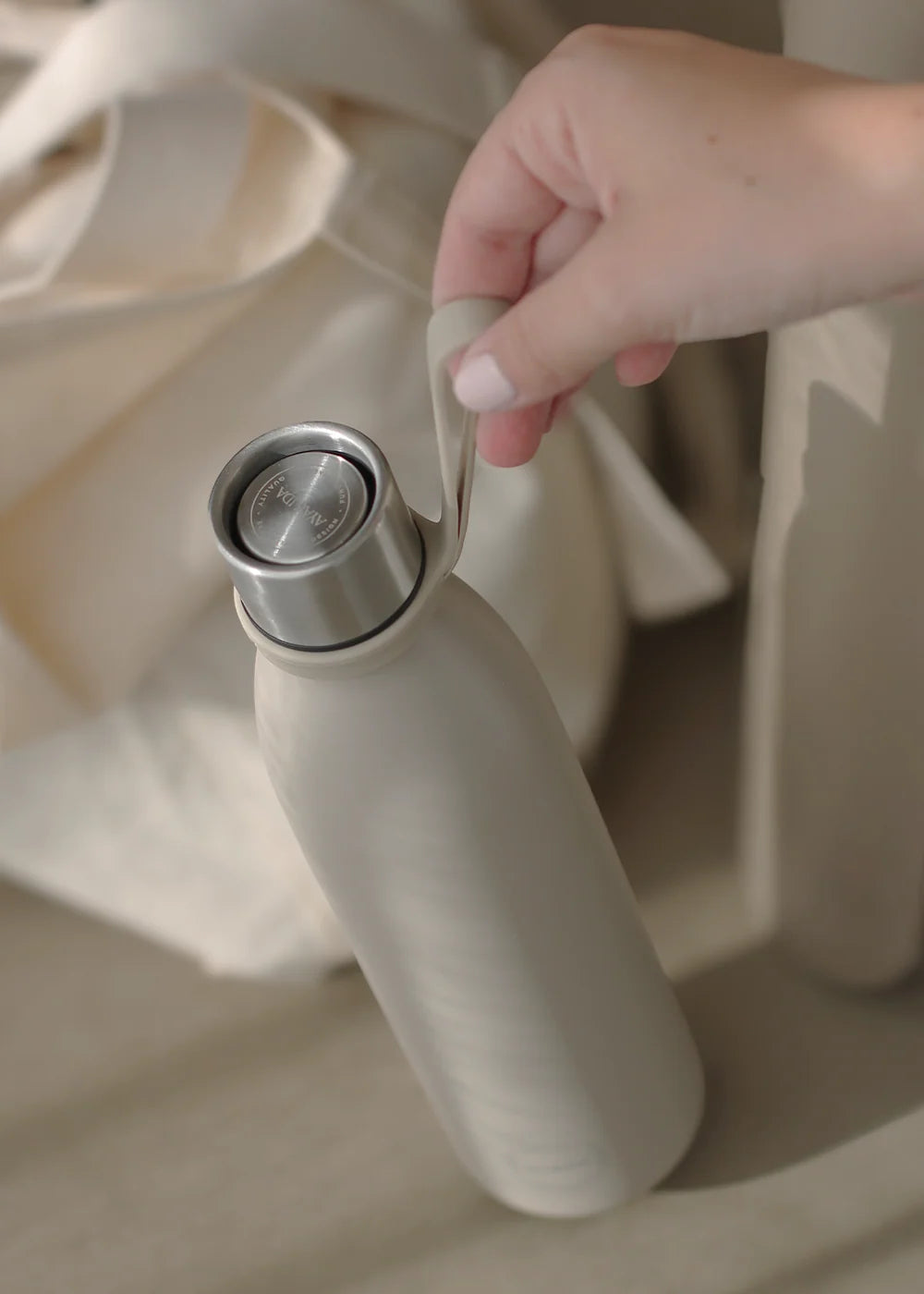 Bottle handle - cream beige