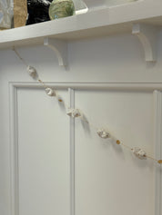 Guirlande med stjerner i æske