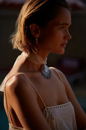 Triple sun earrings